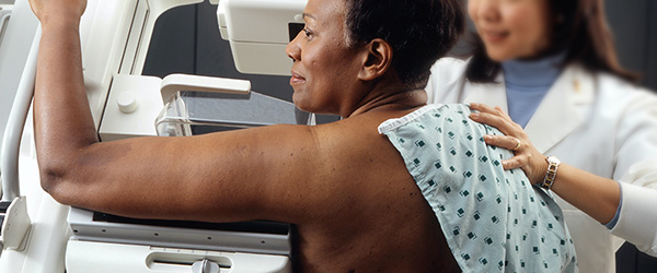 Woman getting a mammogram